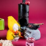 Wichtel kocht am Herd